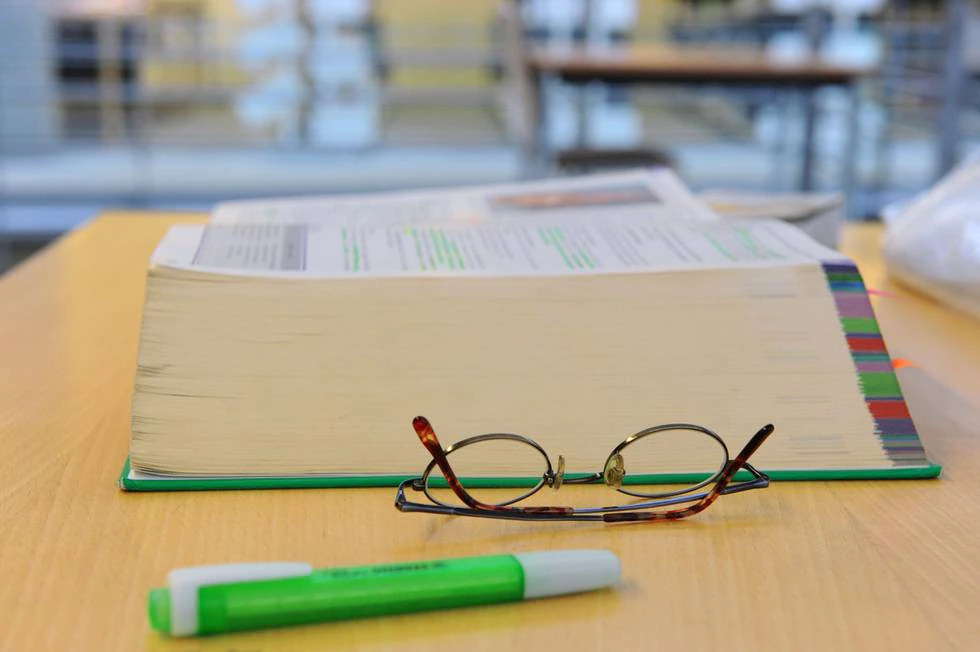Glasses and book on a table